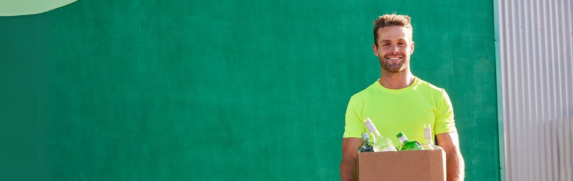 Man holding box of containers