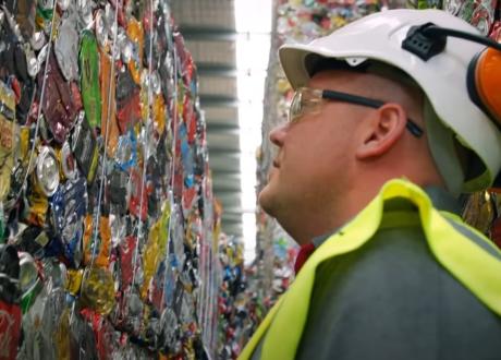 Man looking at containers