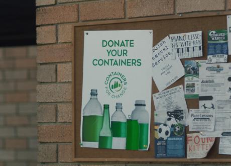 Donate your containers poster on notice board