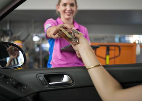 Women holding cash in hand