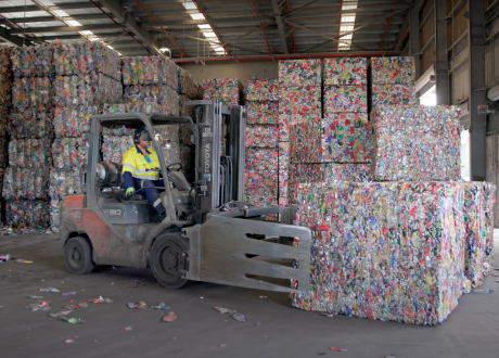 Truck and baled containers